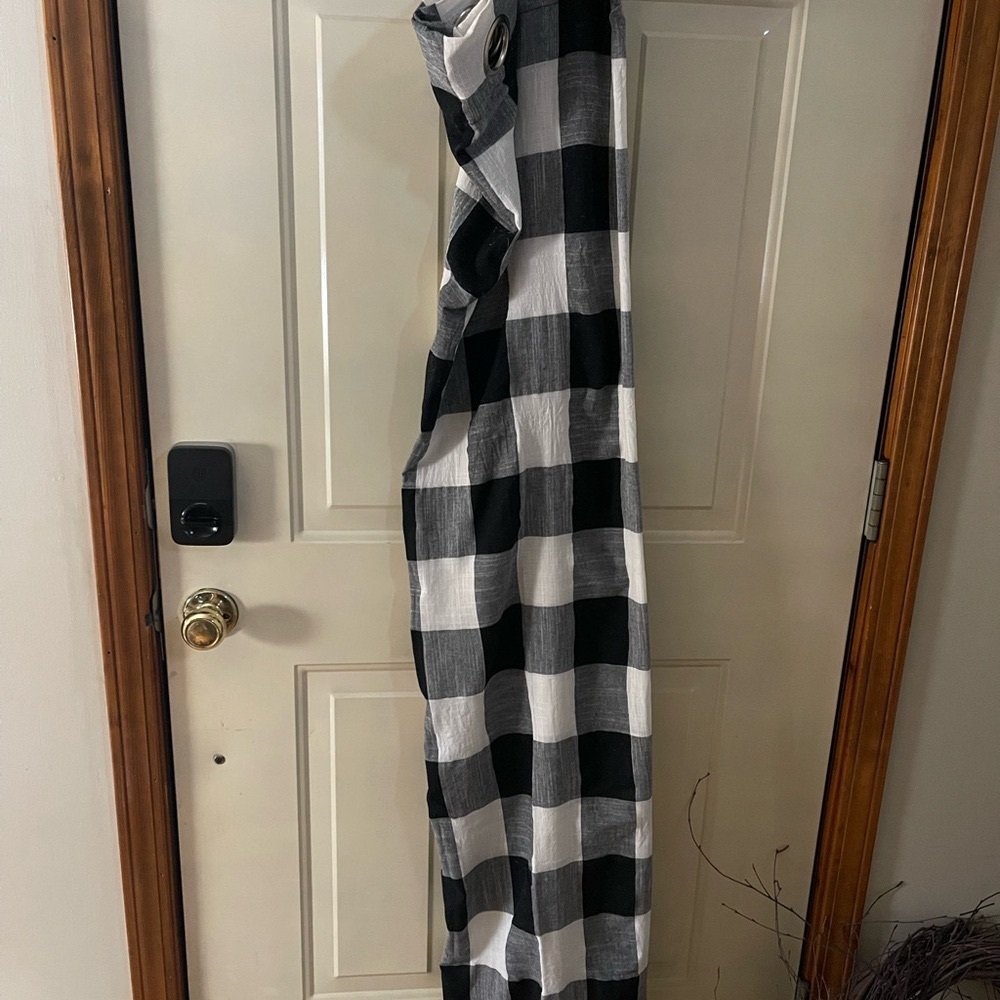 Black and cream curtain panels.  No rips or tears. Smoke free and pet free home.